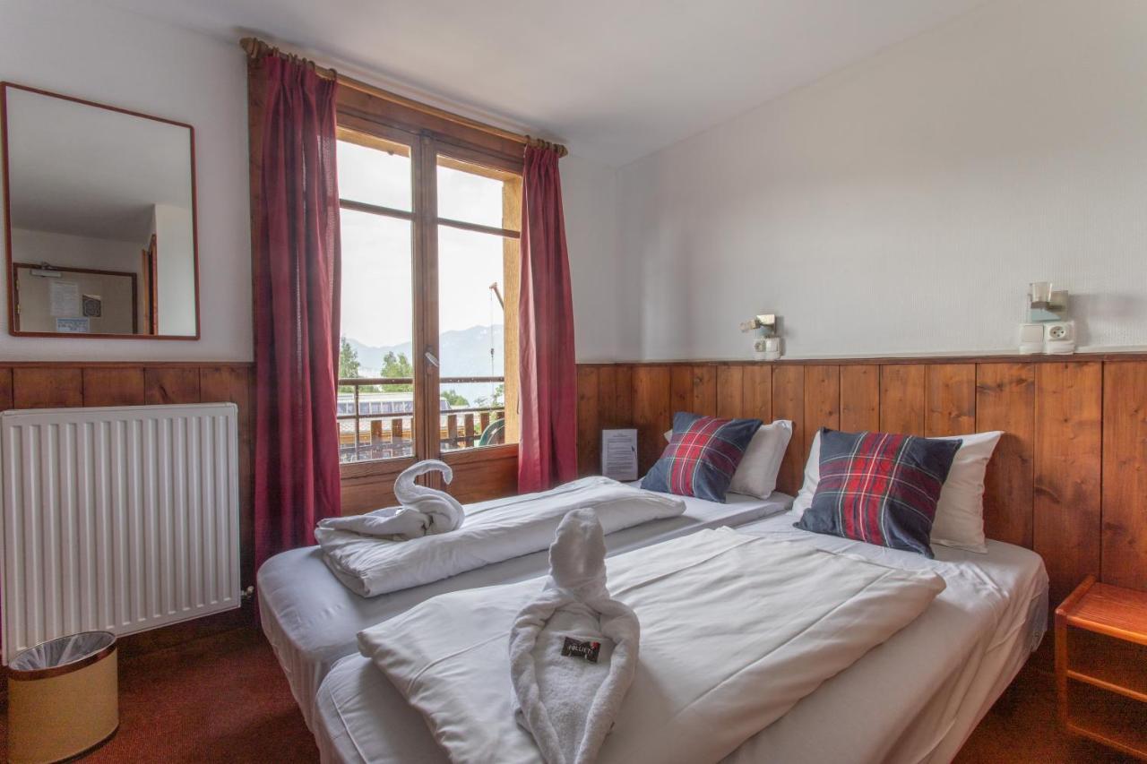 Hotel Le Refuge Alpe d'Huez Bagian luar foto